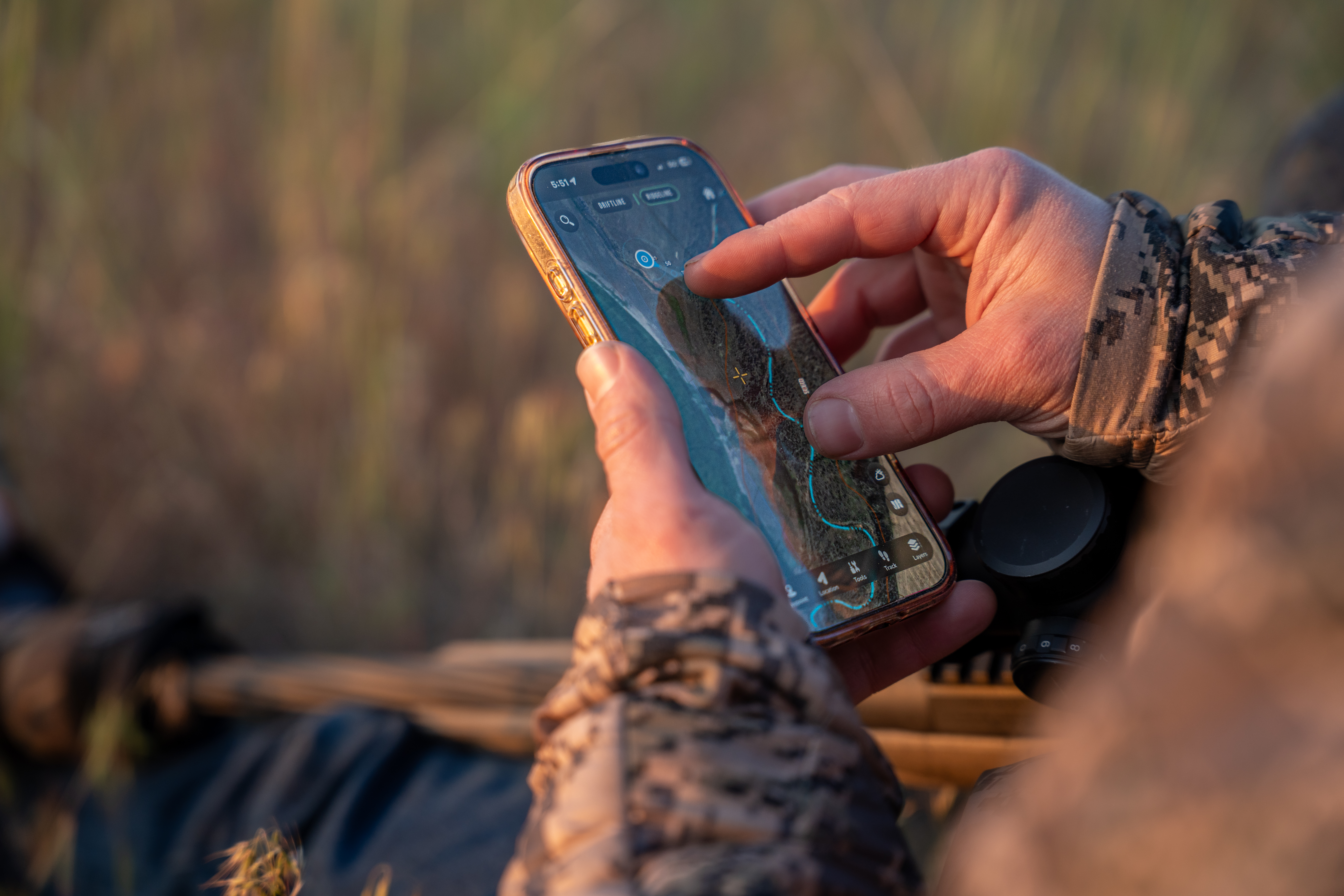 Baseline Maps Ridgeline mode in a hunting blind at golden hour