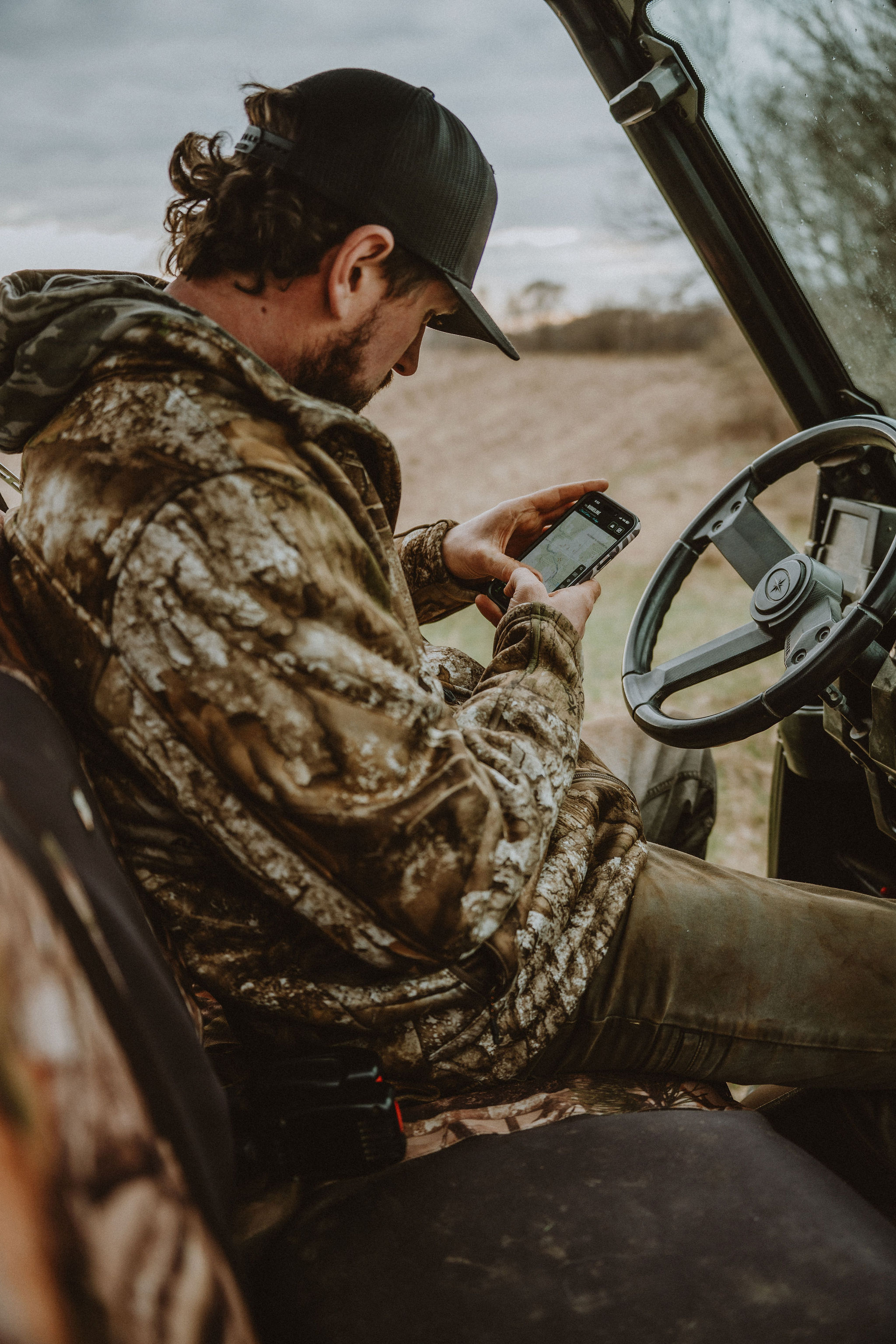 Hunter overlooking a Pacific Northwest field
